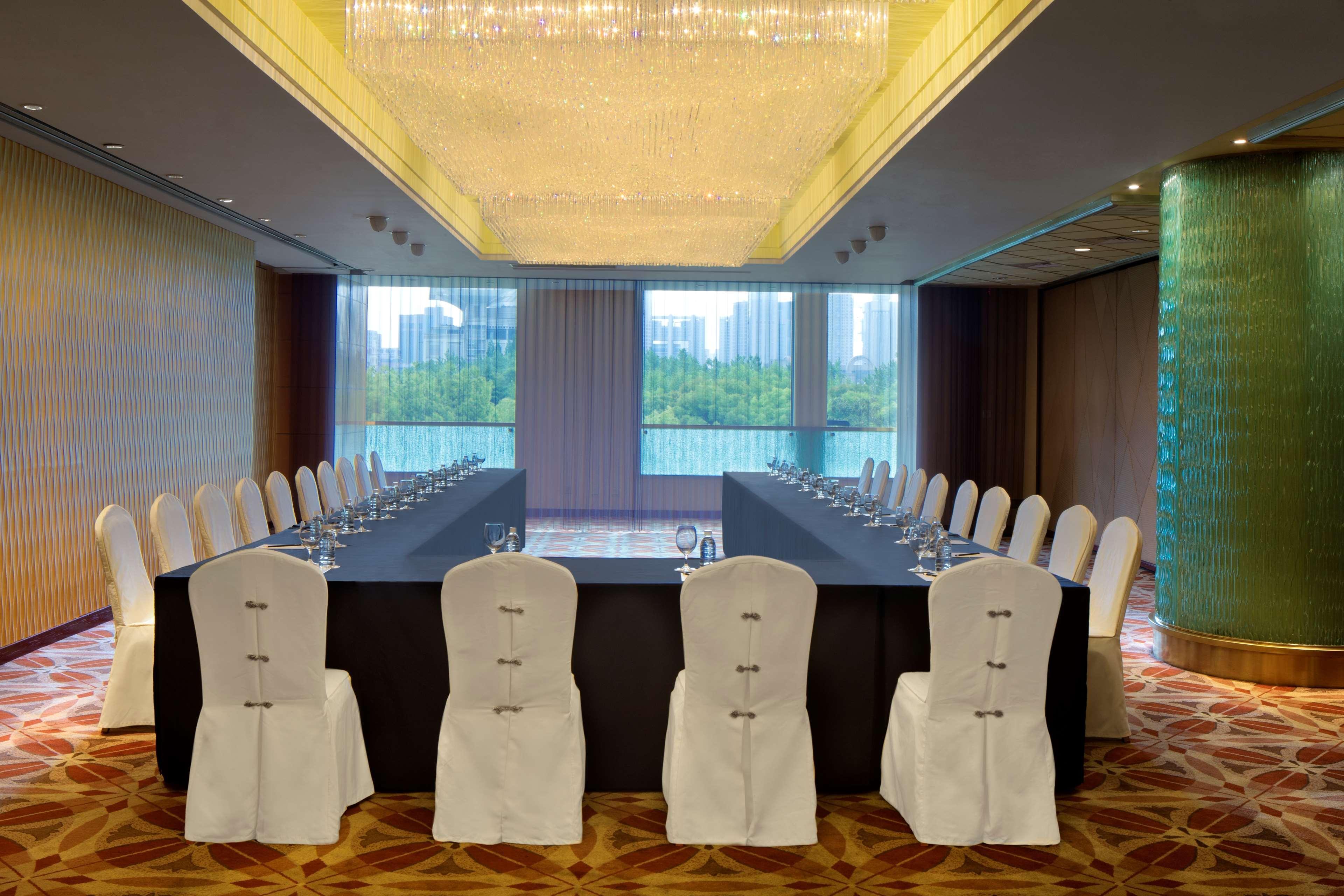 Radisson Blu Hotel Shanghai New World Exterior photo A meeting room at the hotel