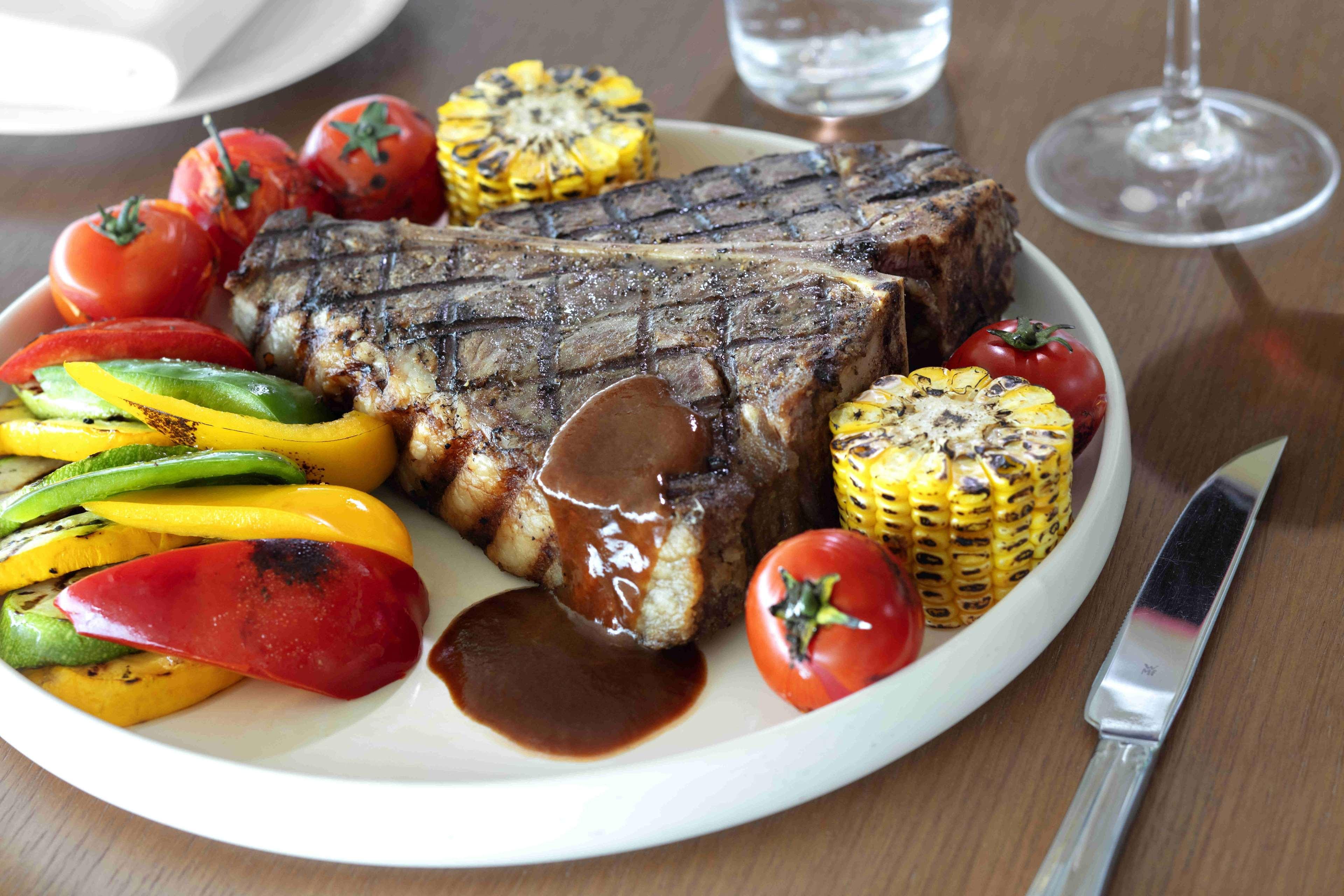 Radisson Blu Hotel Shanghai New World Exterior photo A steak with vegetables