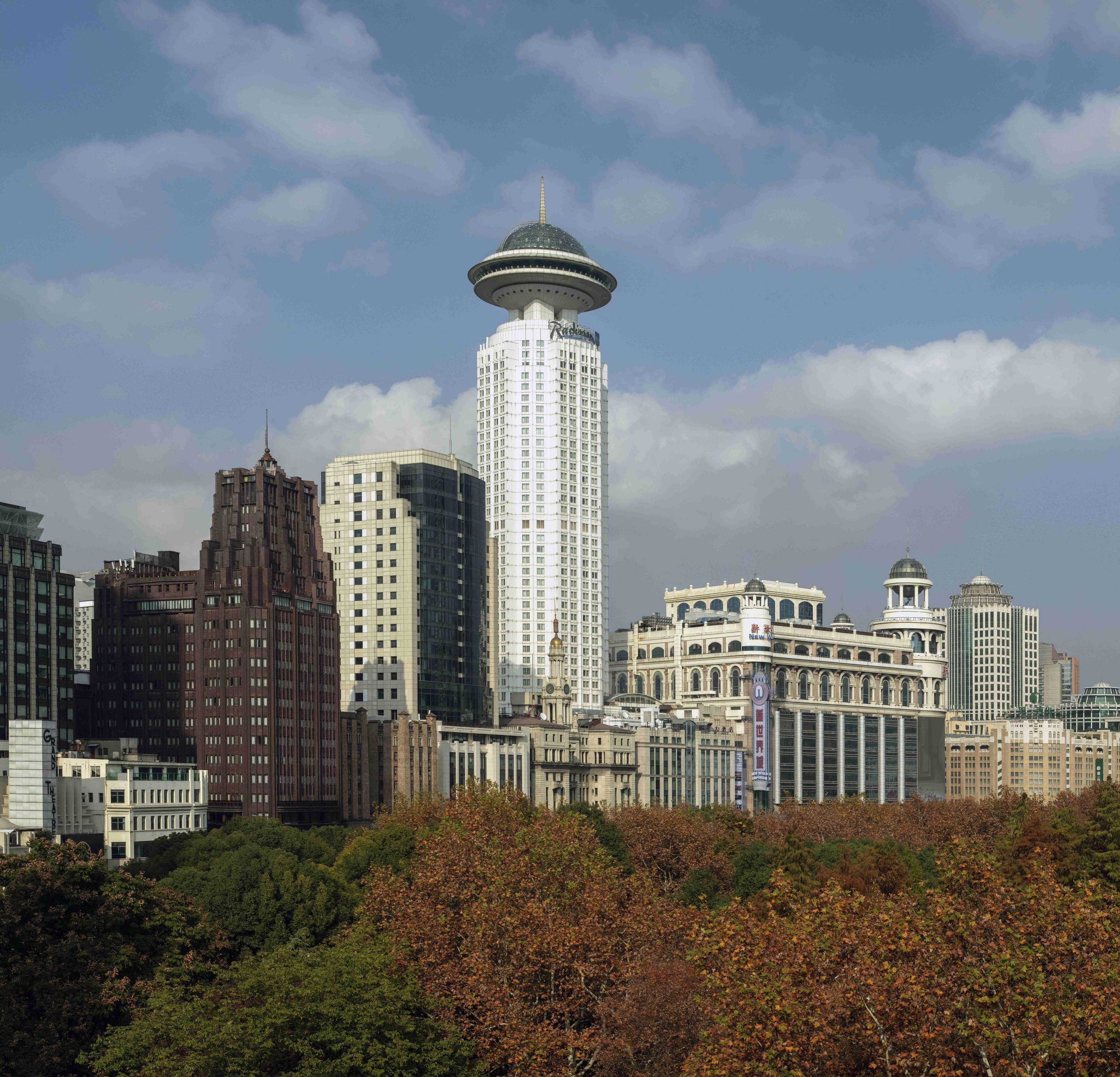 Radisson Blu Hotel Shanghai New World Exterior photo The Orion City