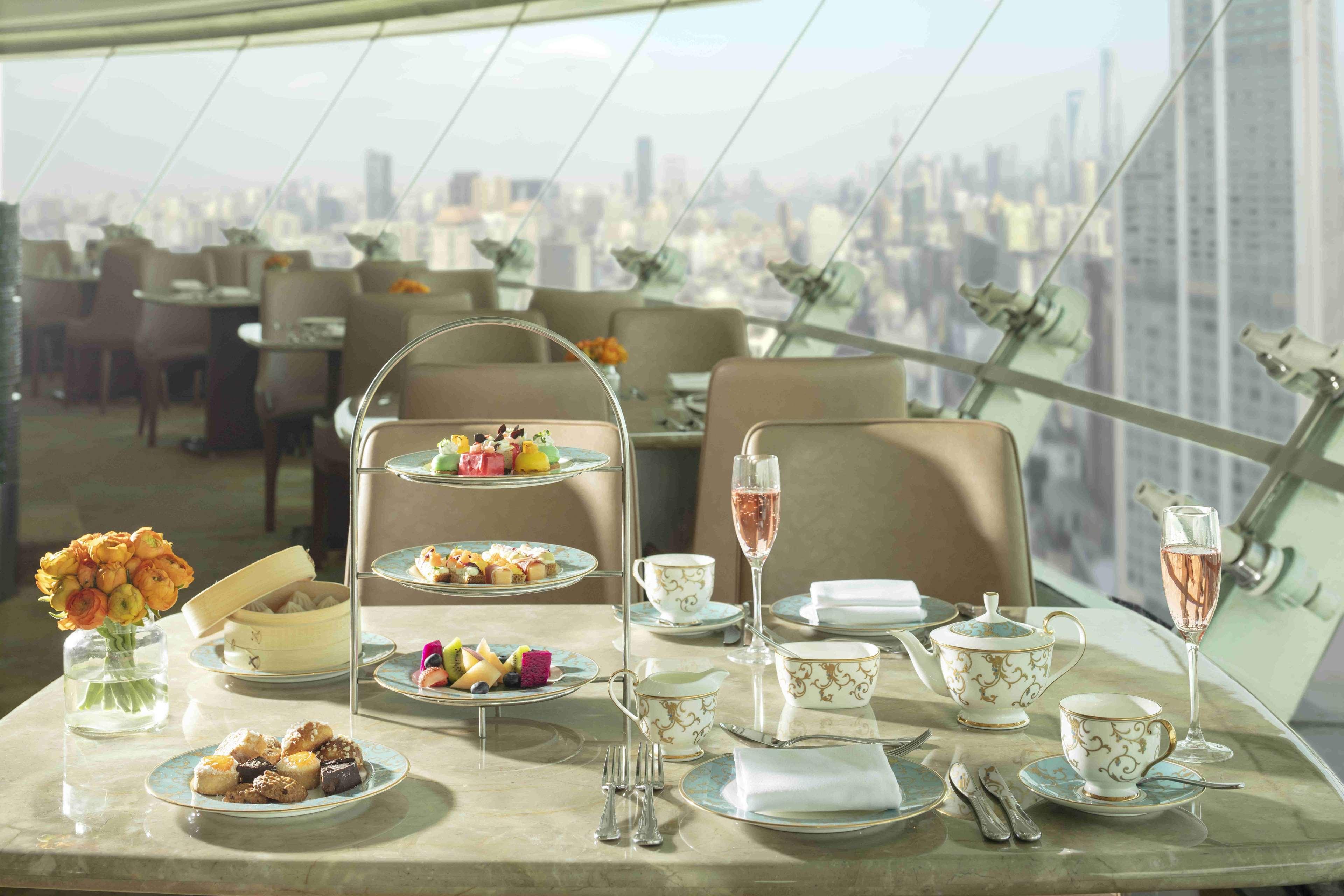 Radisson Blu Hotel Shanghai New World Exterior photo Afternoon tea at the 83rd floor of the Burj Khalifa